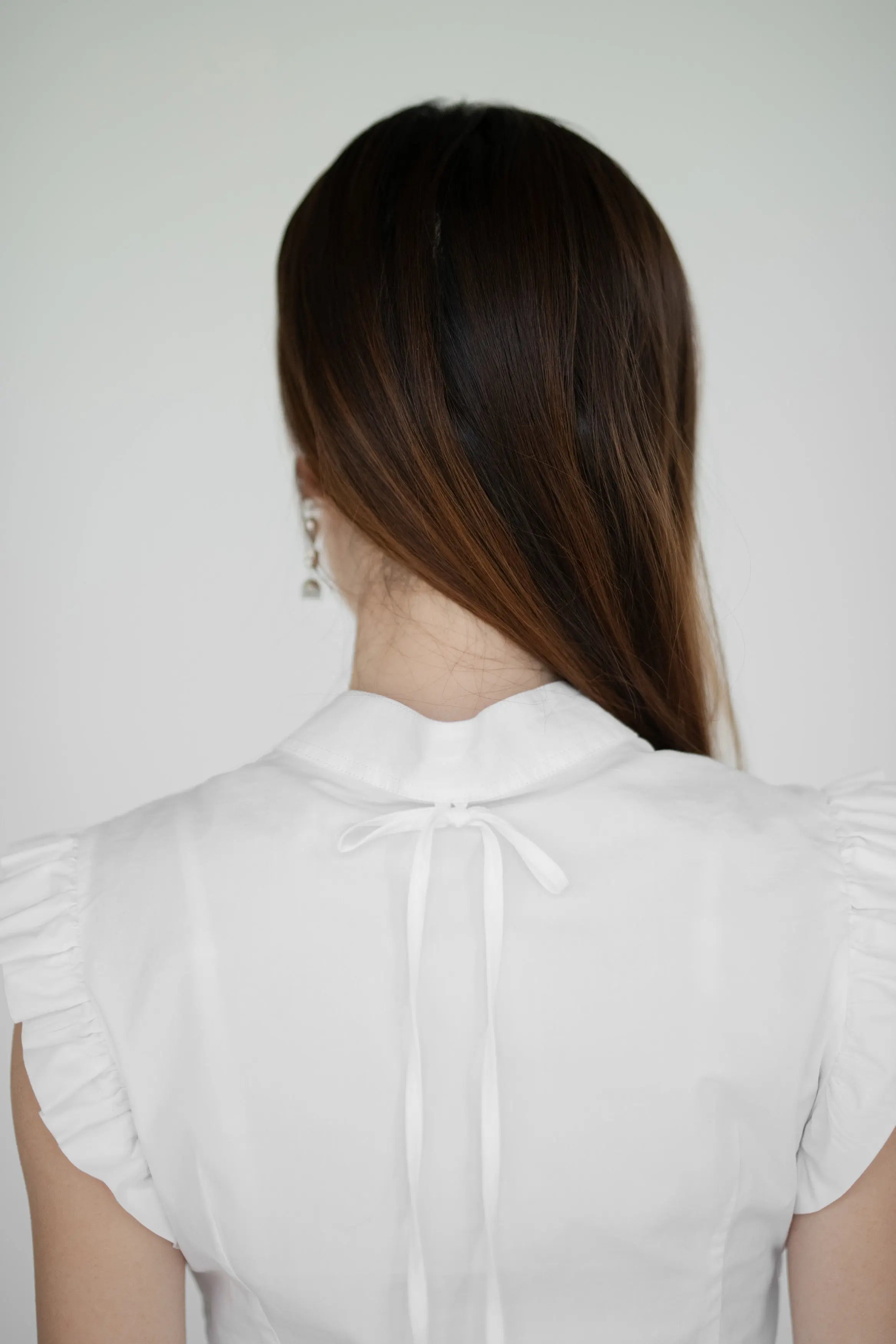 Lina Top White Designation Official