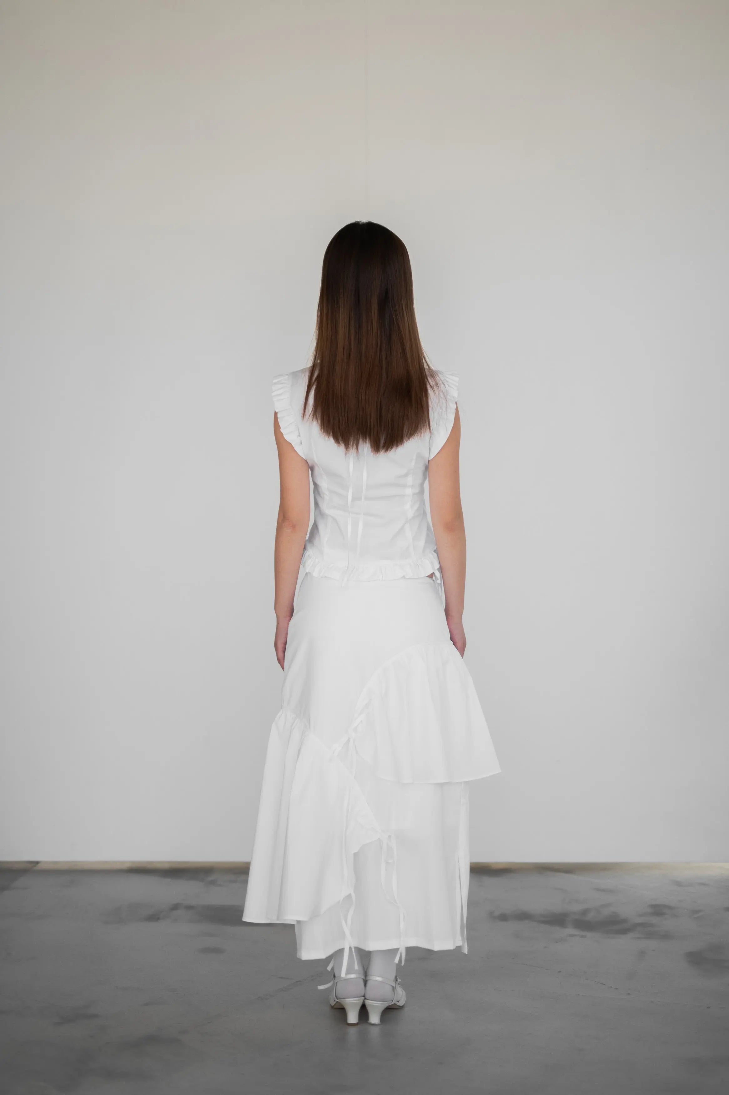 Lina Top White Designation Official