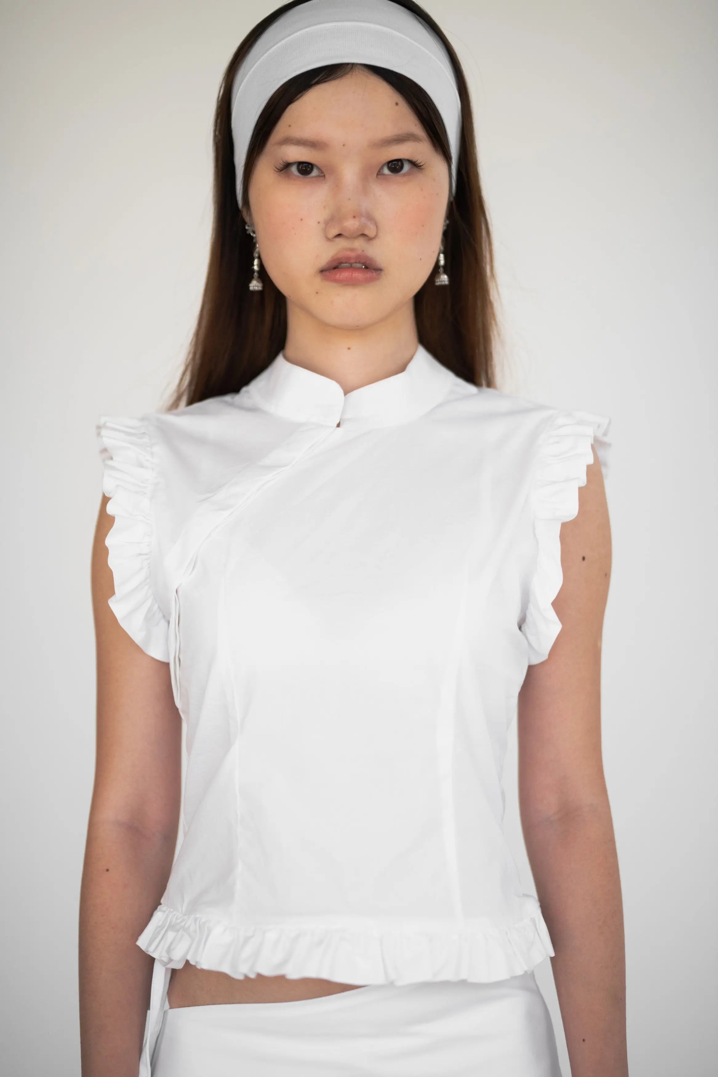 Lina Top White Designation Official