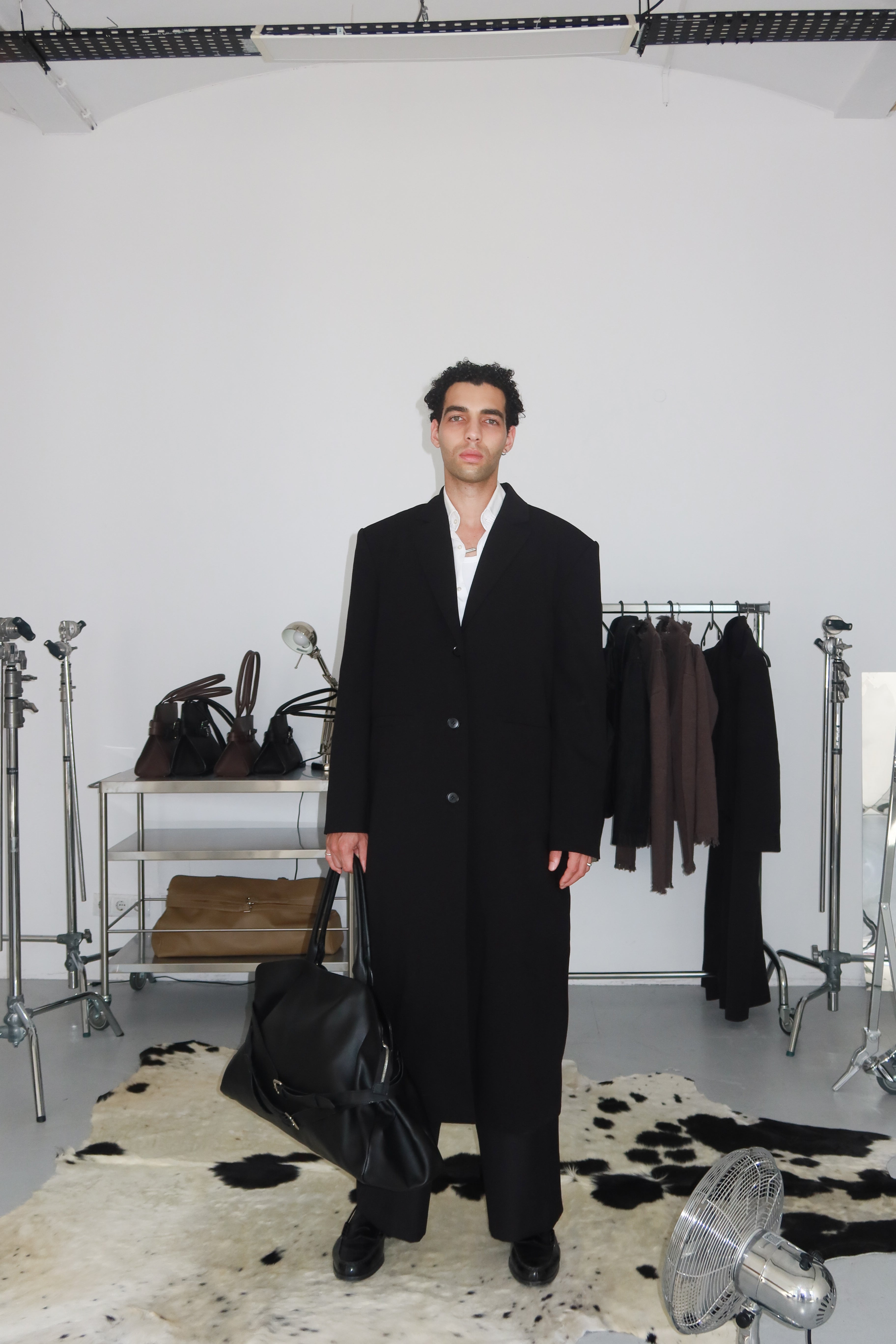 Seven Long Coat Designation Official